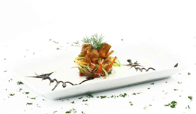 Chef serving plated dish